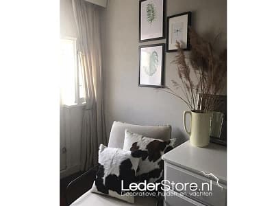 koeienhuid-kussens-in-stoel